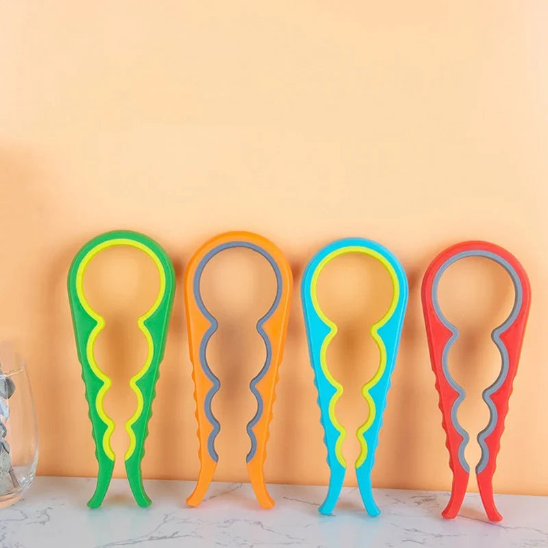 Multifunctional 4-in-1 Kitchen Tool Jar Gripper Lid Opener Can Opener Bottle Opener - Easy to Use Home Essential